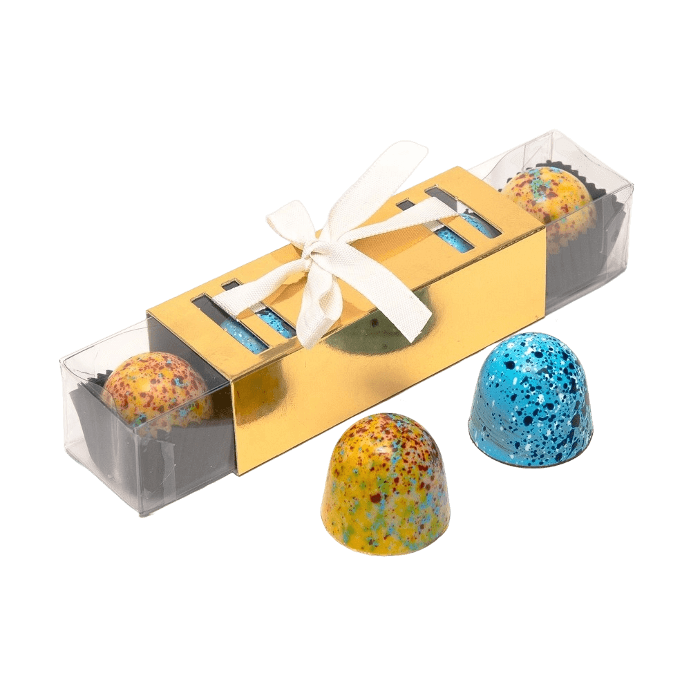 Stick of mango and salted caramel pralines