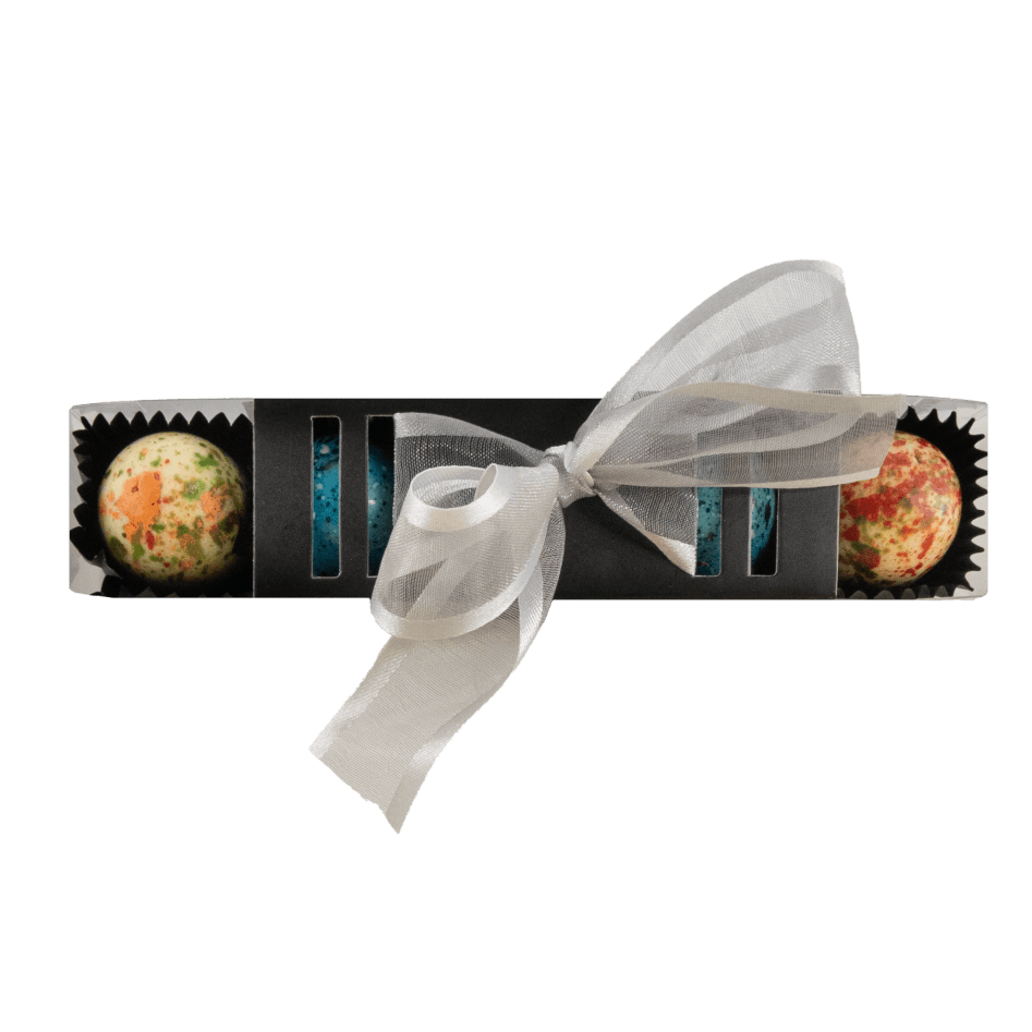 Stick of mango and salted caramel pralines